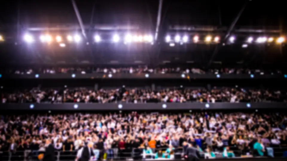 A crowd at a large indoor event