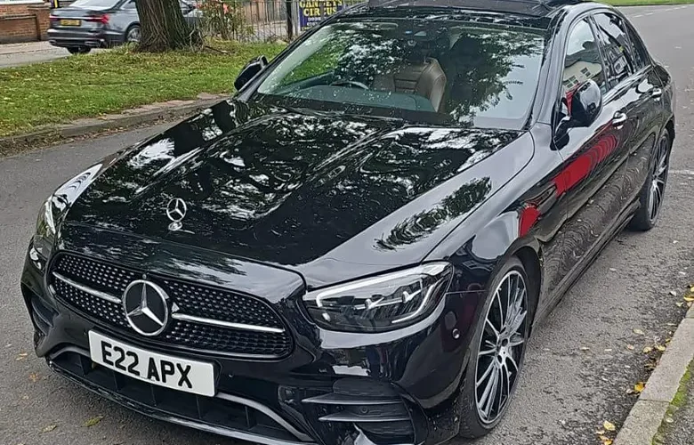 Front three-quarter view of a black Mercedes-Benz E-Class from the Apex fleet
