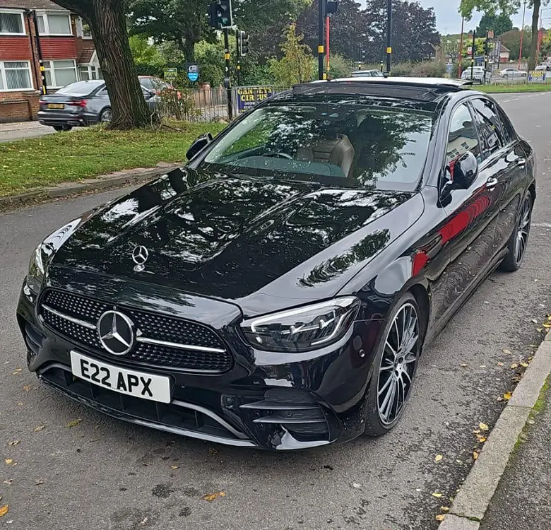 Front three-quarter view of a black Mercedes-Benz E-Class from the Apex fleet